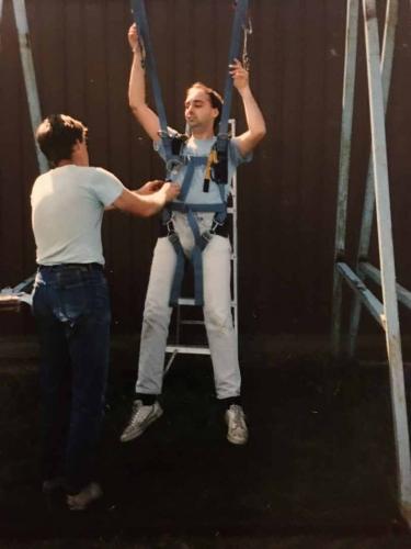Being drilled for emergency procedures in the hanging harness